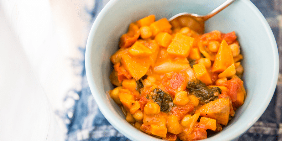 Coconut curry dish in a white bowl