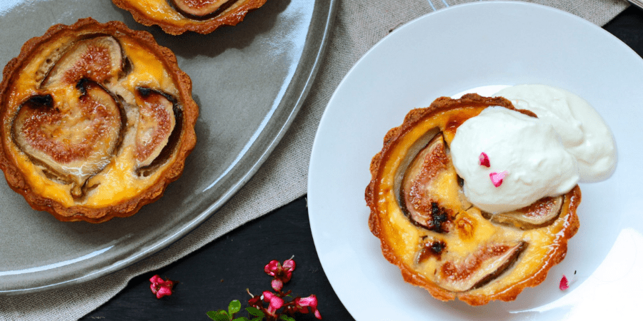 Fig & honey custard tartlets served with yoghurt.